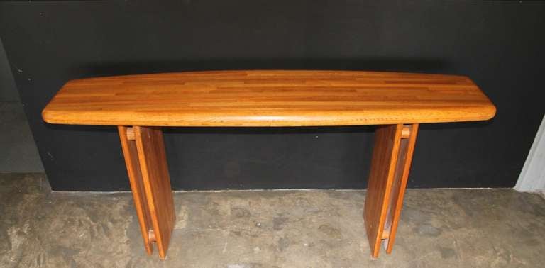 Extraordinary custom made solid oak console table by California Craftsman Lou Hodges for Design Group, San Diego.
c.1976

Please call or use the contact dealer link below to reach us directly with any questions regarding this item. We are happy