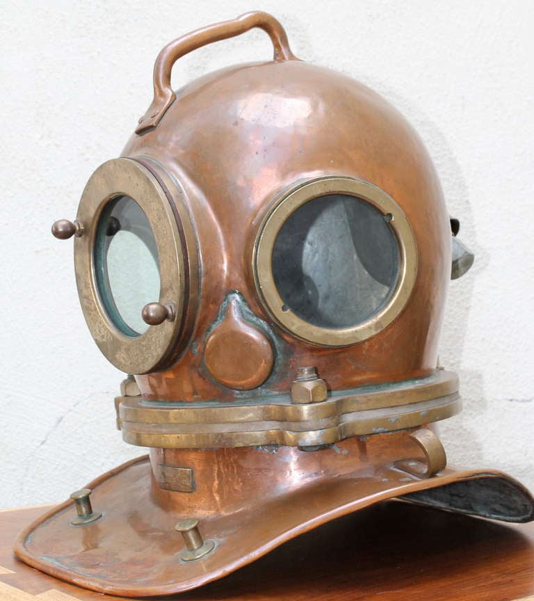 Vintage Russian Diving Helmet Model UVS50m, Made of Copper.
c.1970's 
Helmet is in very  good condition.  
It was made in LeningOriginal, Russian diving helmet UVS-50M , made in the USSR's 28th Naval Factory of Leningrad, now St.Petersburg .
The