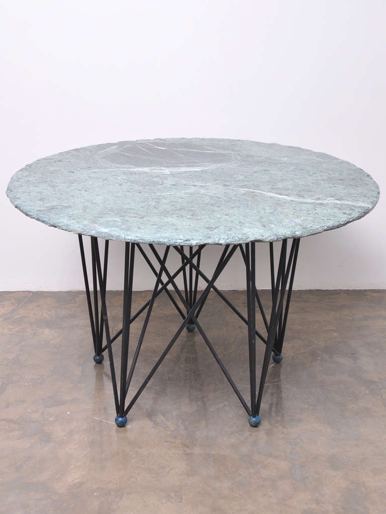 Unique and unusual geometrical wrought iron and green marble center or dining table, circa 1950.
Executed at the workshop of Manuel Chacón 