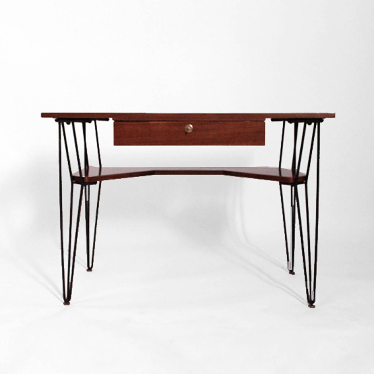 Desk made in solid wood covered in rosewood with structure made in black lacquer metal. Italy 1950´s. Measures: 58 x 75(h) cm
