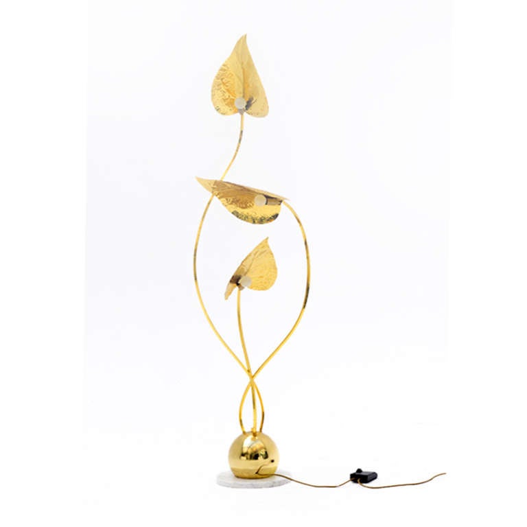 Floor lamp designed by Tommaso Barbi, hand-made in golden brass in vegetable form with round marble base. Italy 1970’s. Measures: 33 base /46(diameter) x 164 (h)