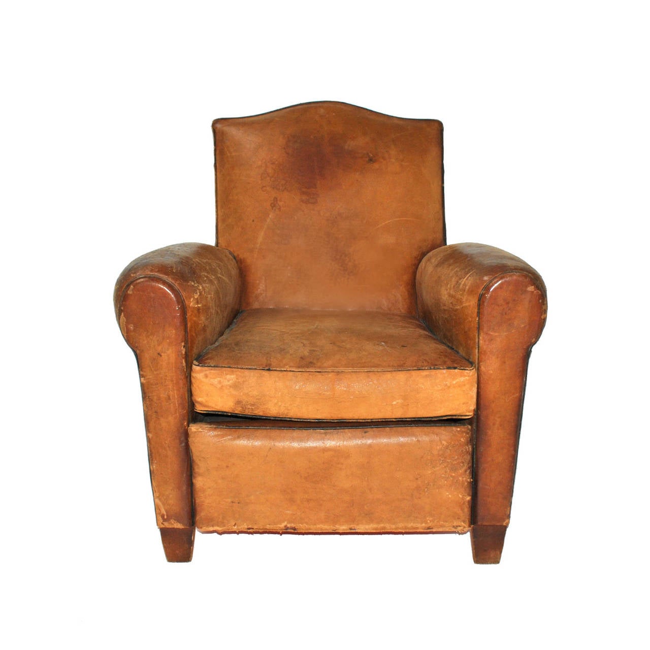 Pair of club armchair with structure made in solid wood upholstered in leather and finished in brass tack at back.