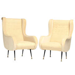 Pair of armchairs in Senior style.