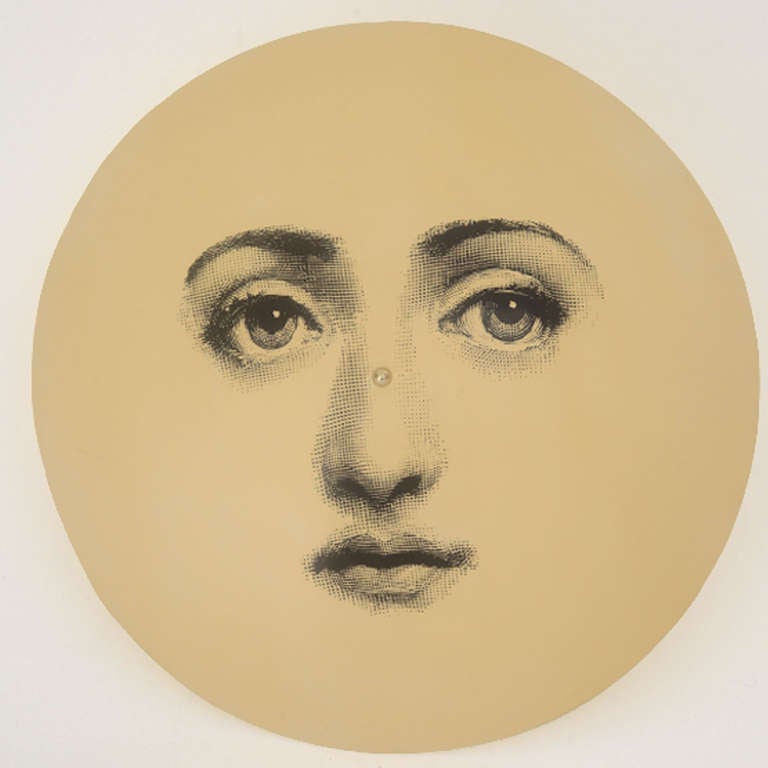 Sconce designed by Piero Fornasetti  (1913-1988)  made in lacquer iron in circular form, with serigraphy print. Italy 1950.