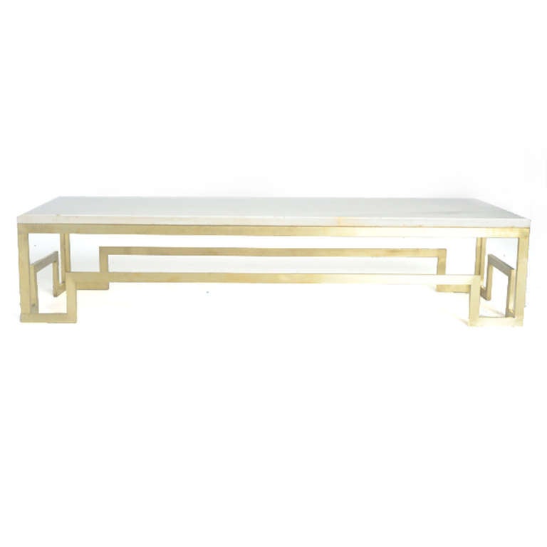 Center table designed by Emilio Rey made in brass in geometrical form and Macaelâ??s marble on top. Spain, 1960.