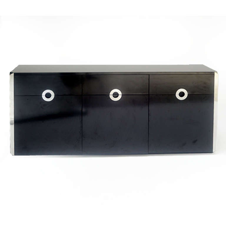 Sideboard with bar designed by Willy Rizzo (1928- 2013) for Pierre Cardin. Composed by drawers, doors and bar cabinet made in black lacquer solid wood finished in steel. Italy, 1970.