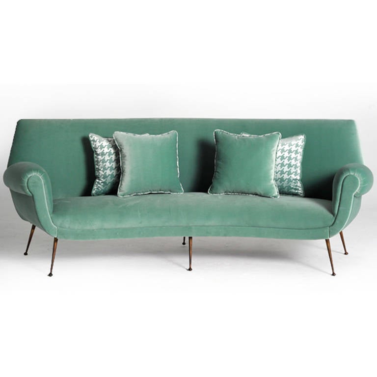 Four-seats semicircular sofa made in solid wood and ledged in brass upholstered in mint cotton Gancedo’s velvet. Italy 1950’s.