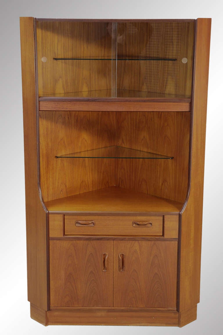 A quality teak corner cabinet designed by Kofod Larsen for the G-Plan Danish line.