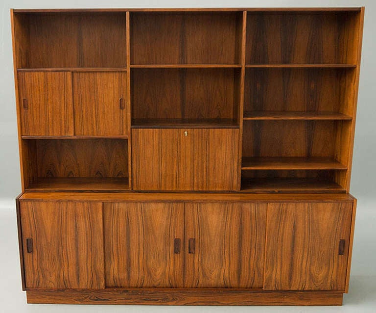 A stunning rosewood wall unit by Westergaards Mobelfabrik. Superb quality with mesmerizing, matched rosewood grain. 