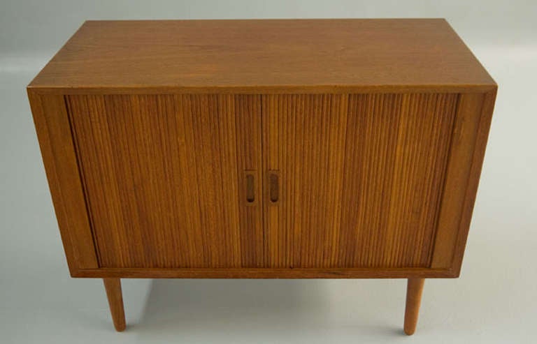 A classic tambour doors credenza in a compact size.