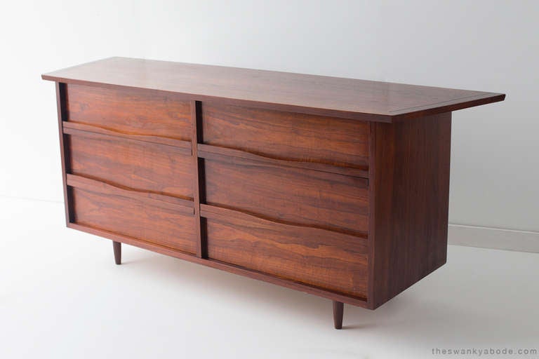 This George Nakashima dresser for Widdicomb is in original vintage condition. It does have imperfections due to age (pictured). This piece is beautiful in person.
Designer: George Nakashima.
Manufacturer: Widdicomb.
Period/Model: Mid-Century
