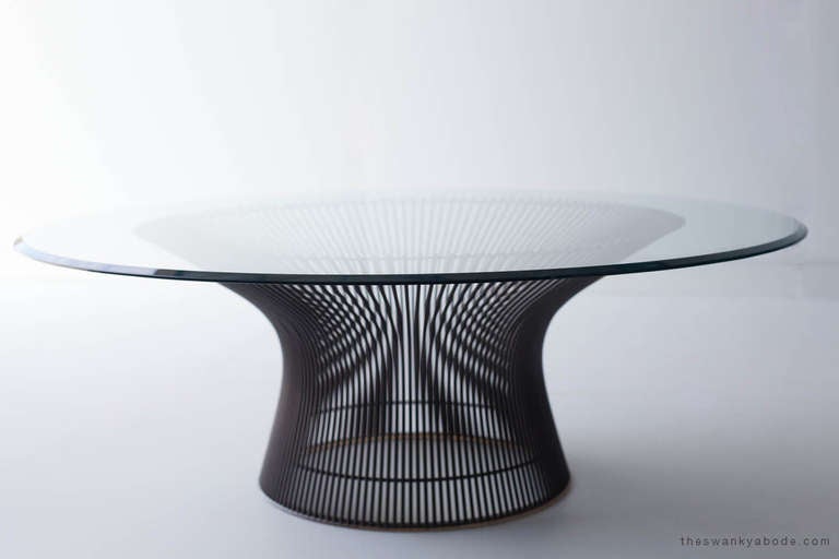 designer: Warren Platner

Manufacturer: Knoll International

Period/Model: Mid Century Modern

Specs: Bronze, Glass

condition

This Warren Platner coffee table is in excellent vintage condition. The glass has one small chip (pictured) and