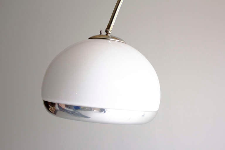 Harvey Guzzini Arc Lamp for Laurel Lighting Co.

The lamp is in good vintage condition and is very sturdy. There are scratches around the rim of the globe and on the chrome of the arc. There are also small chips around the edges of the marble.