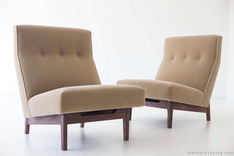 These Jens Risom lounge chairs for Jens Risom Design Inc. have been completely restored to their original integrity. They boast hand cut foam and Mohair. The wood is restored but does have normal wear and slight imperfections. 

designer: Jens