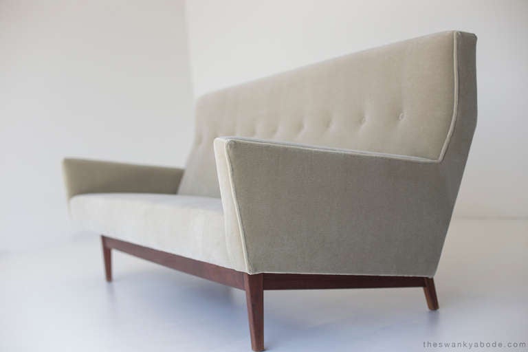 This Jens Risom sofa for Jens Risom Design Inc., is completely restored to its original integrity. It boasts hand-cut foam and mohair. The wood is restored but does have normal wear and slight. It's amazing in person.

Designer: Jens