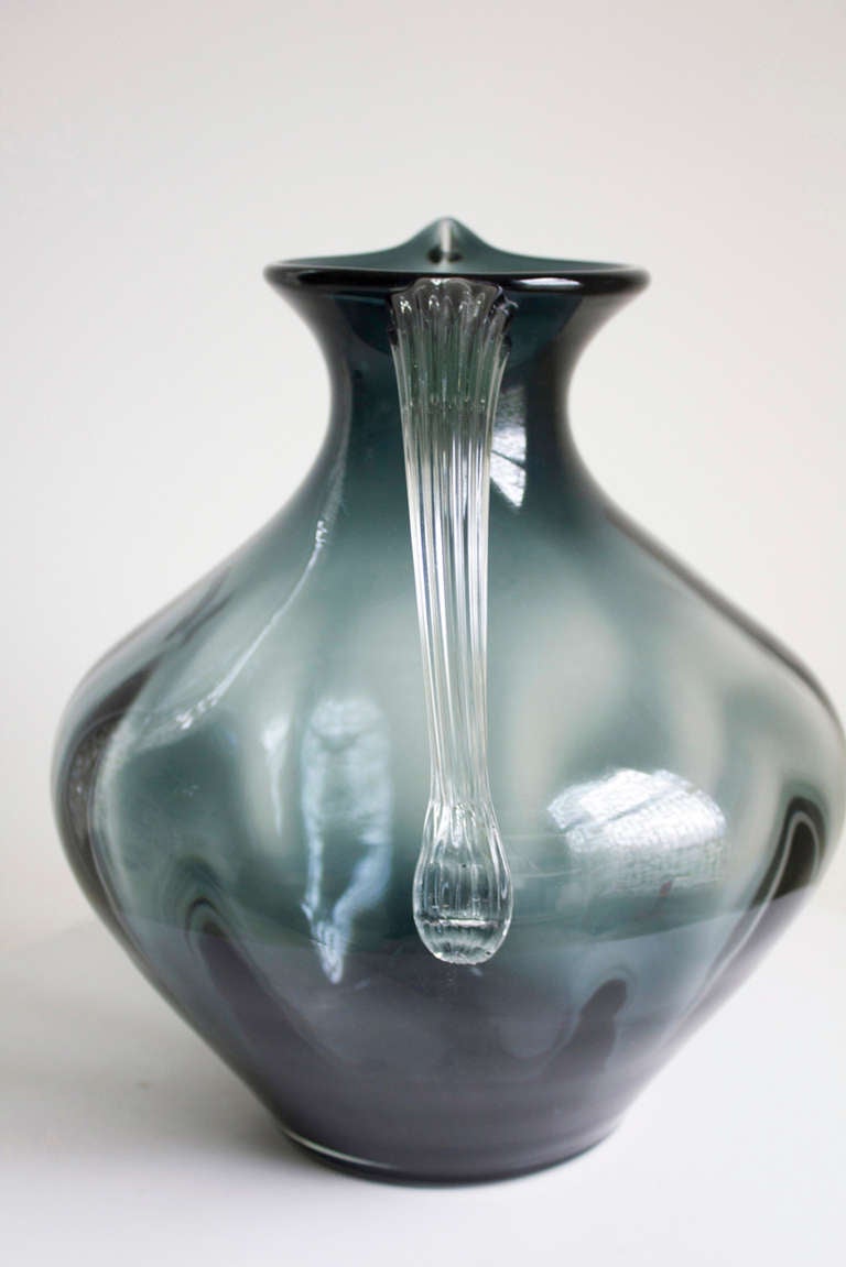 Blenko Pitcher Smoked Glass

Excellent vintage condition.  

H: 12.5 (31.75cm)
D: 11.5 (29.2cm)

Please ask all questions prior to purchase :)

Cheers,
theSwankyAbode.com team
330.466.7350