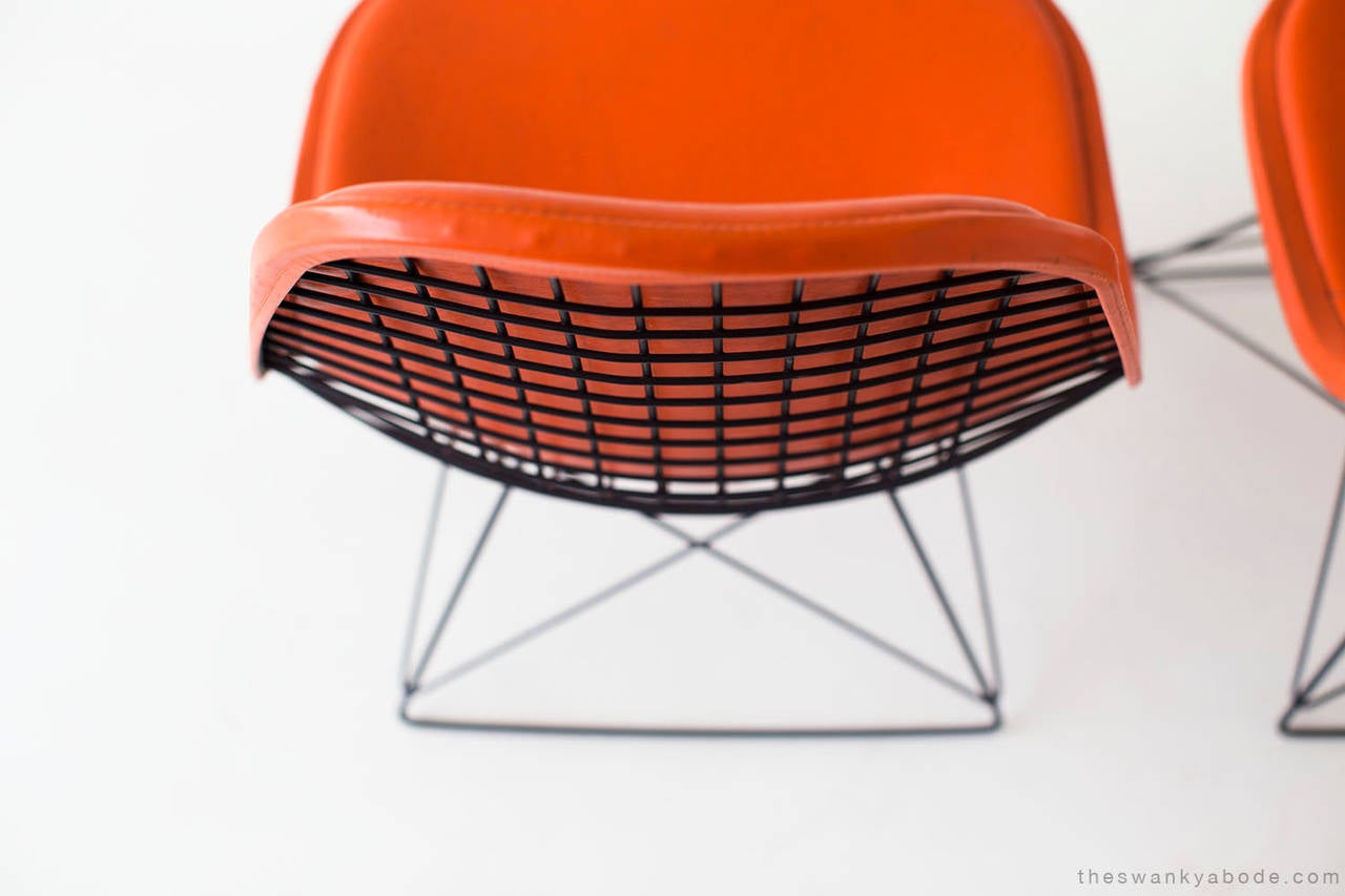 Designer: Ray and Charles Eames.

Manufacturer: Herman Miller.
Period and model: Mid-Century Modern.
Specifications: Metal, vinyl. 

Condition:

These Ray and Charles Eames LKR-1 lounge chairs for Herman Miller are in very good vintage