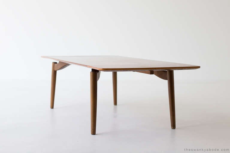 Designer: George Tanier
Manufacturer: George Tanier (Importer)
Period and Model: Mid-Century Modern
Specs: Walnut

Condition: This George Tanier coffee table for George Tanier (imports) is in good vintage condition. It has its original finish