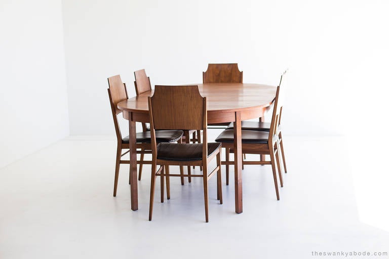 Table de salle à manger en bois de rose du milieu du siècle dernier en vente 3