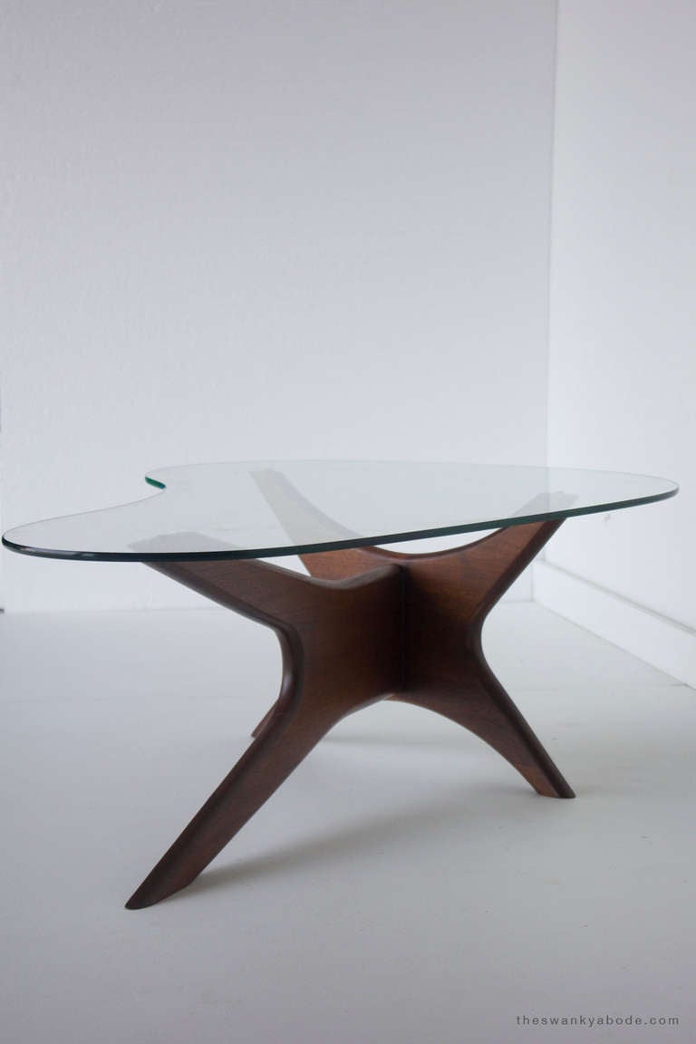 designer: Adrian Pearsall

Manufacturer: Craft Associates
Period/Model: Mid Century Modern
Specs: Walnut, Glass

condition

This Adrian Pearsall kidney shaped coffee table for Craft Associates has been completely restored to its original