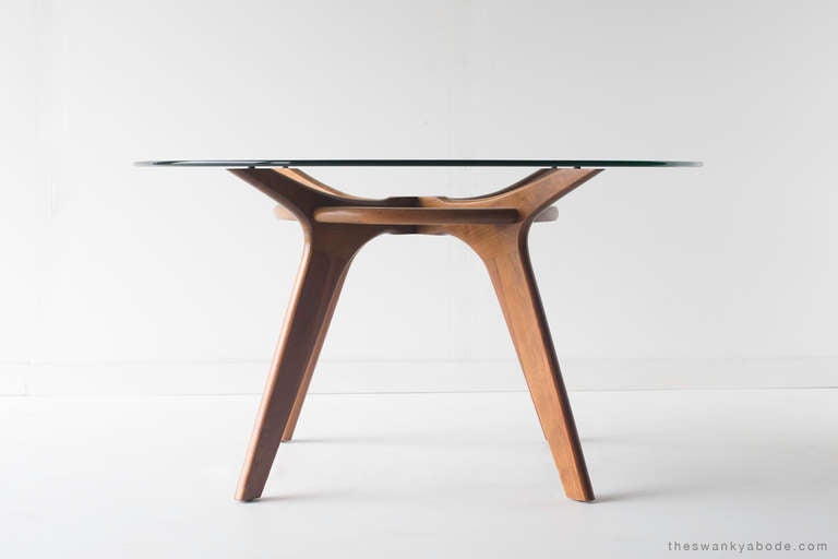 Designer: Adrian Pearsall.

Manufacturer: Craft Associates.
Period and model: Mid-Century Modern, 
Specs: Walnut, high-grade foam, commercial grade fabric, original crystal top.

Condition:

This Adrian Pearsall game table and chairs for