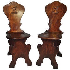 A Good George II Pair of Mahogany Scabello Hall Chairs