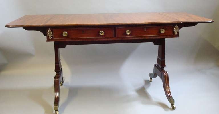 A Good Regency Mahogany and Brass Mounted Sofa Table 1