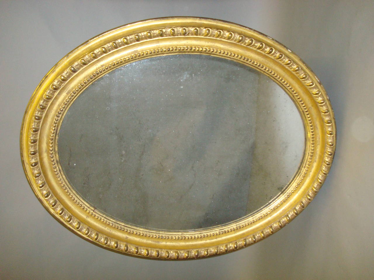 Early 19th Century Giltwood Oval Wall Mirror In Excellent Condition For Sale In Moreton-in-Marsh, Gloucestershire