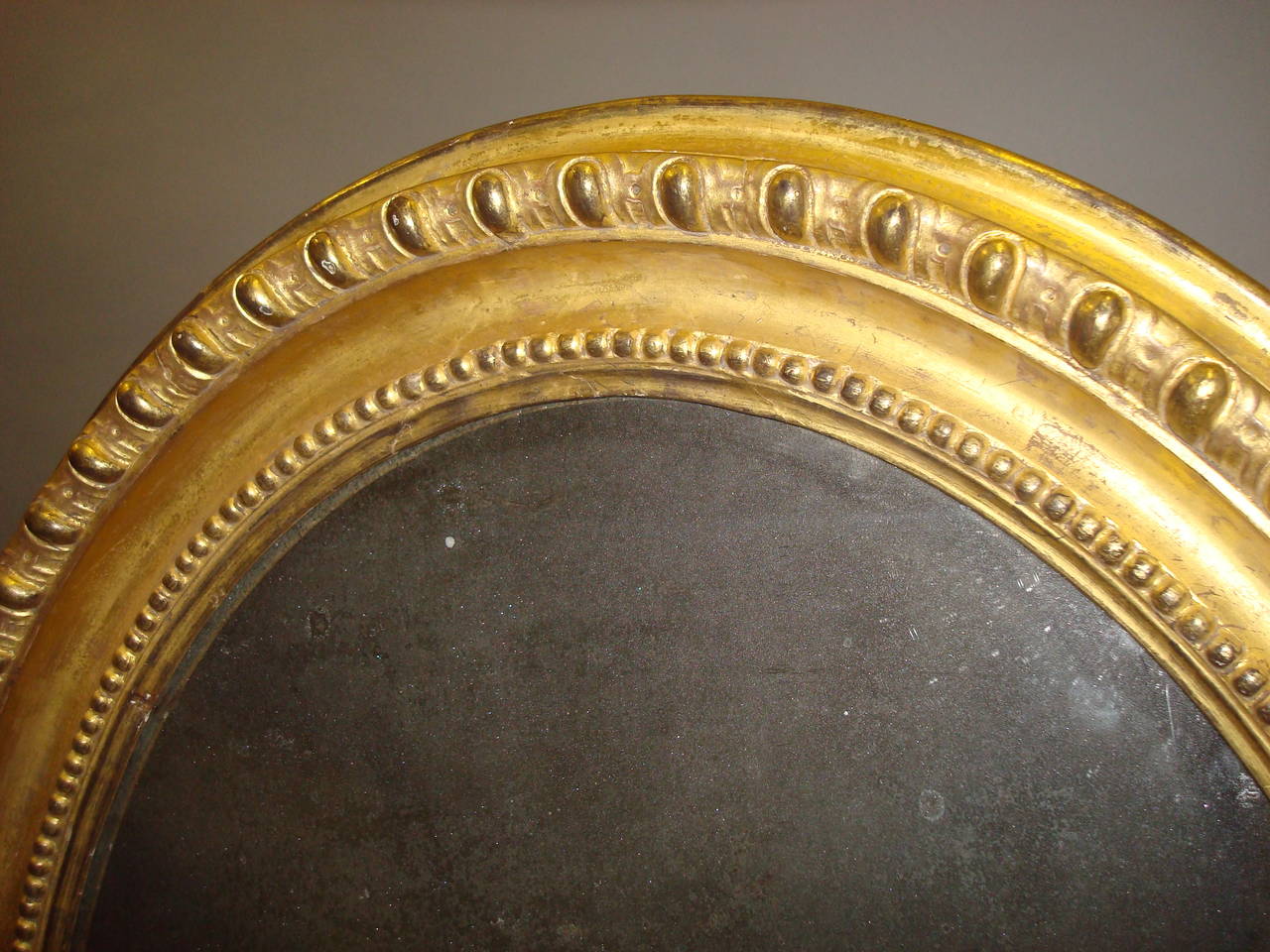 Early 19th Century Giltwood Oval Wall Mirror For Sale 2