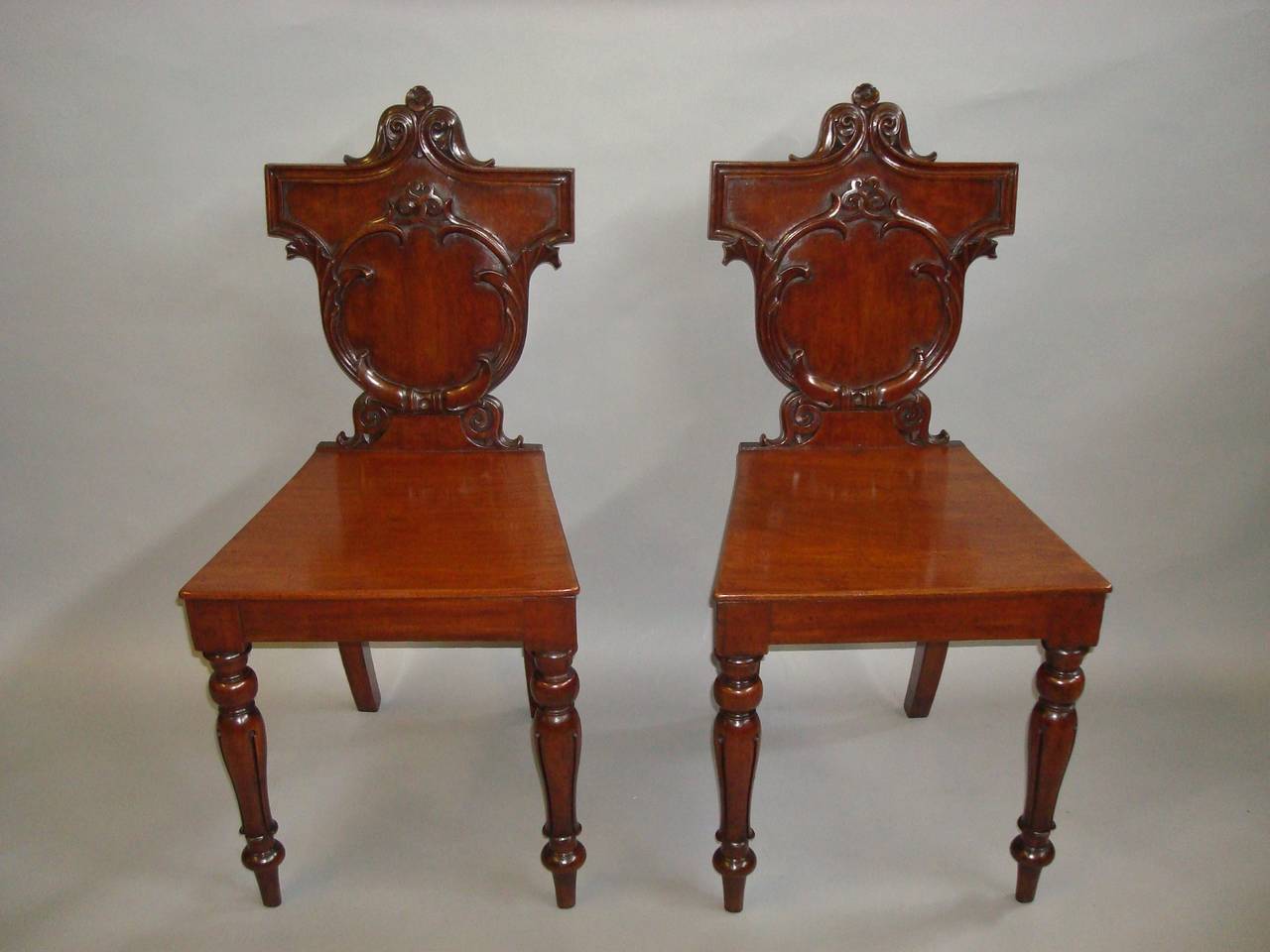Late Regency Pair of Irish Mahogany Hall Chairs at 1stDibs