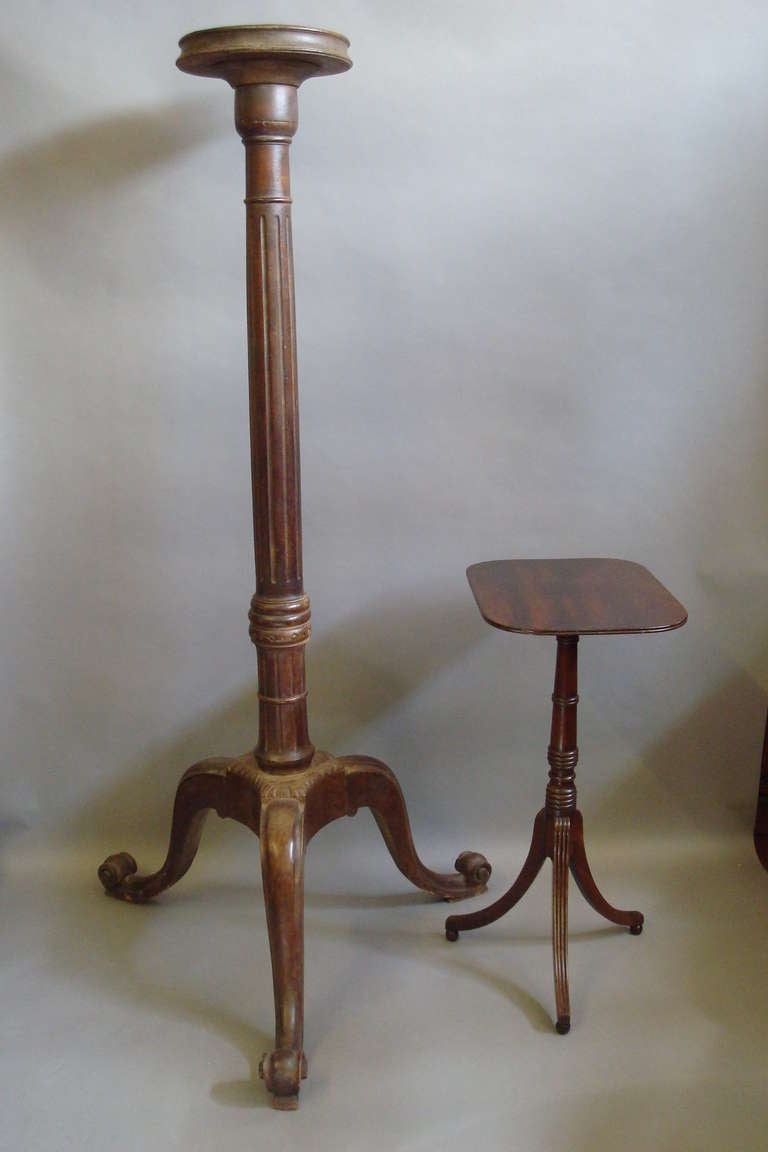 A monumental, 'country house', Georgian carved mahogany torchere; the circular moulded top on a turned fluted column with carved collars; raised on bold cabriole legs with carved scrolled toes; in lovely, untouched, dry, 'country house'