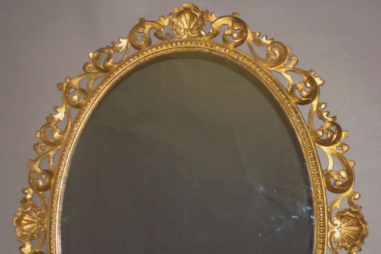 Rococo Mid-19th Century Pair of Florentine Gilt Wood Wall Mirrors For Sale