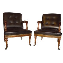 A Good George IV Pair of Walnut and Leather Library Chairs