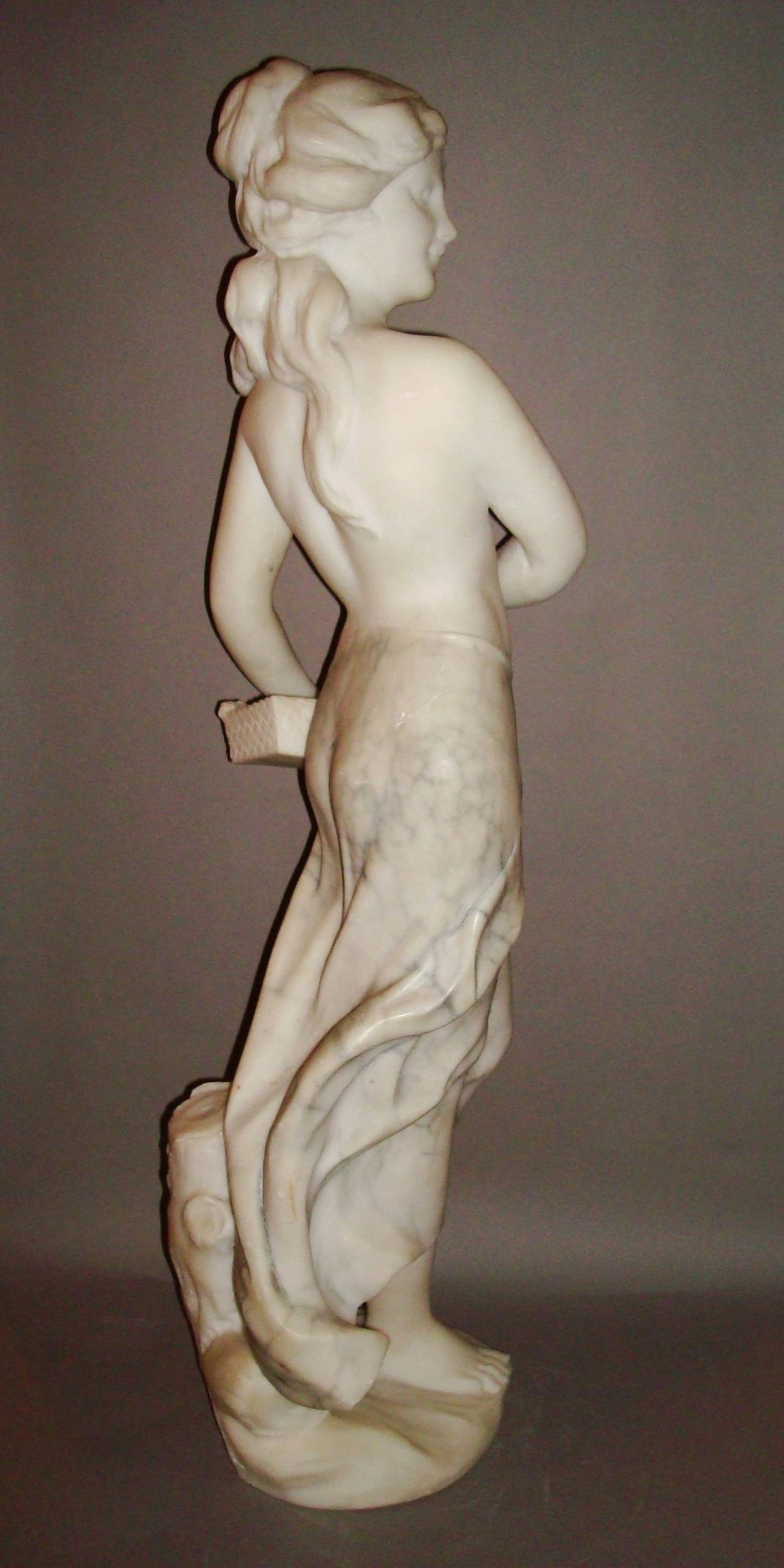 An Early C20th Marble Sculpture of a Young Woman 1
