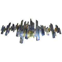 Chrome and Brass Cityscape Wall Sculpture by C. Jere