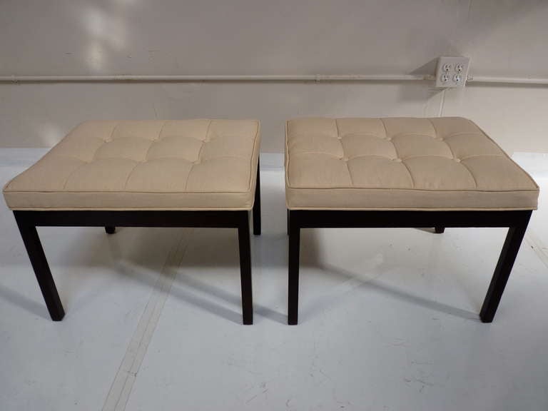 Pair of Tufted Benches on dark walnut hued base. Pair has been recently upholstered in a neutral fabric and is ready for installation.