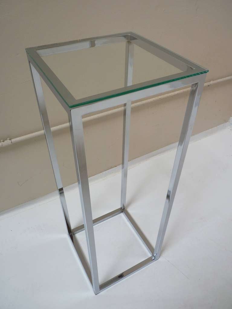 Open construction chrome plated steel pedestal. Great for display of sculpture or potted plants!