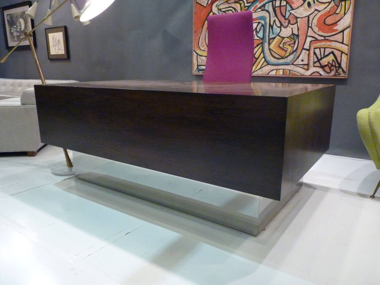 Executive desk by Milo Baughman in rosewood with chrome base, circa 1974. Recently refinished and ready for installation.