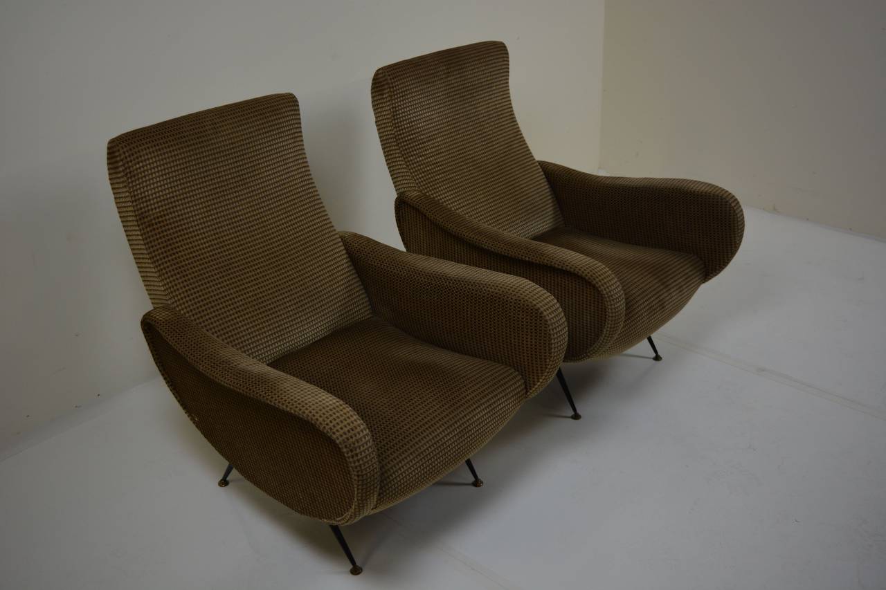 Pair of Italian chairs after Marco Zanuso with lacquered brass legs and vintage Italian upholstery. Re-upholstery is suggested.