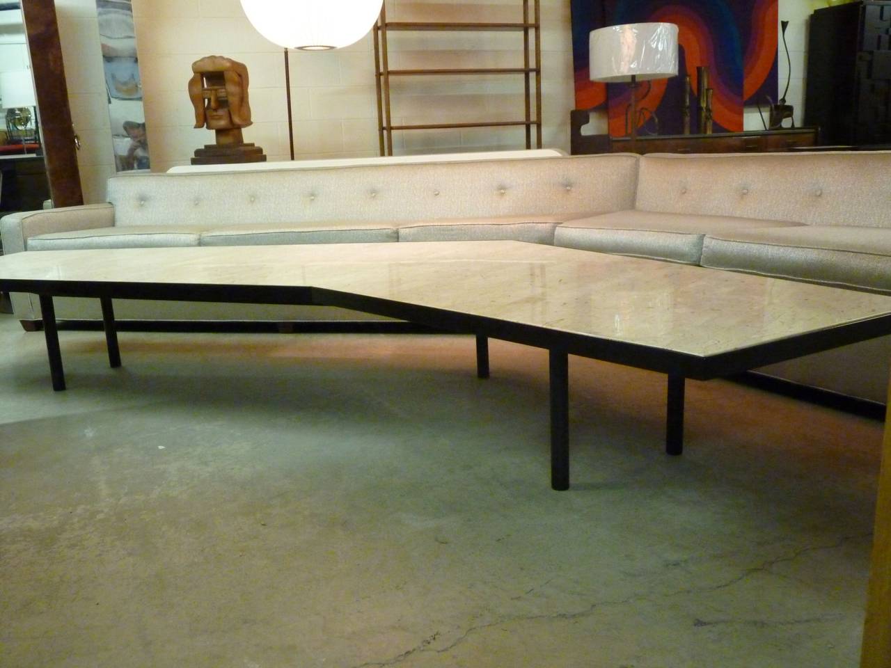 Monumental living room suite, circa 1959, from a pedigreed modern home in Rancho Santa Fe, California. The sofa measures 16 linear feet and is made up of a 9 foot and 7 foot section. The cocktail table is 11 linear feet and measures 10 feet from