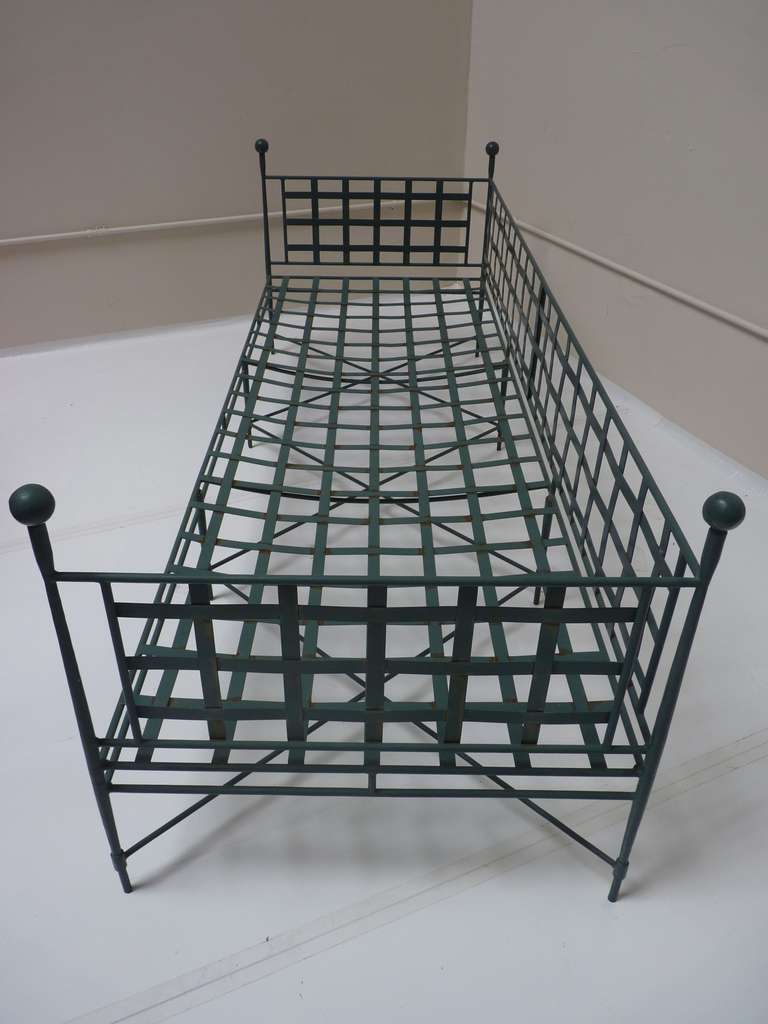 Woven wrought iron Sofa/Daybed with ball finials and criss-crossed stretchers designed by Mario Papperzini for Salterini. 

Please see our other listings for pieces from the same series.