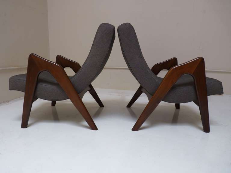 Pair of lounge chairs by Adrian Pearsall for Craft Associates in refinished solid walnut frames. Recent upholstery in a black and white woven blend.