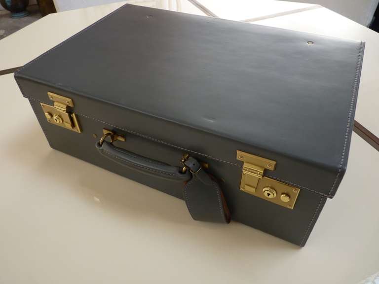 Bentley Motors Weekender Case by Swaine, Adeney, & Brigg was originally offered as a dealer accessory at time of purchasing a new Bentley motorcar. Swaine, Adeney, & Brigg is a celebrated English maker of fine equestrian and leather goods since