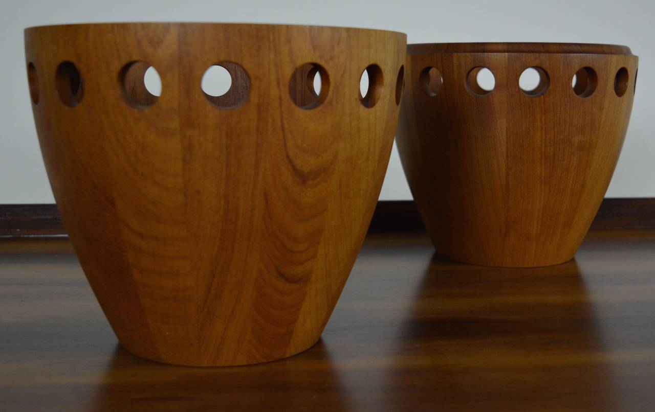 This pair of fruit bowls designed by Jens Quistgaard for Dansk is rarely seen as one part often goes missing. Each of the rims fit together with a male and female side. When together the bowls display as sculpture, adding more value to the already