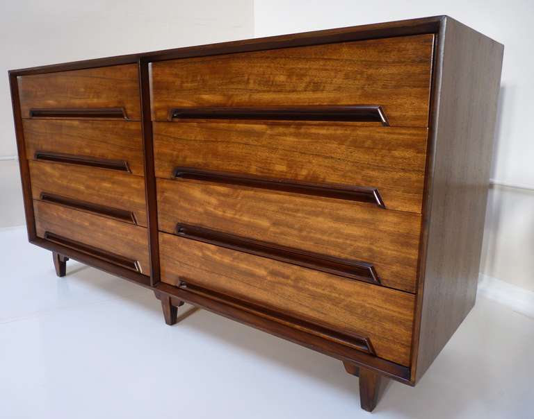 An excellent Primavera wood Dresser for Drexel's Perspective Line designed by Milo Baughman early in his career. The wood appears to have movement and dances beautifully when lit.