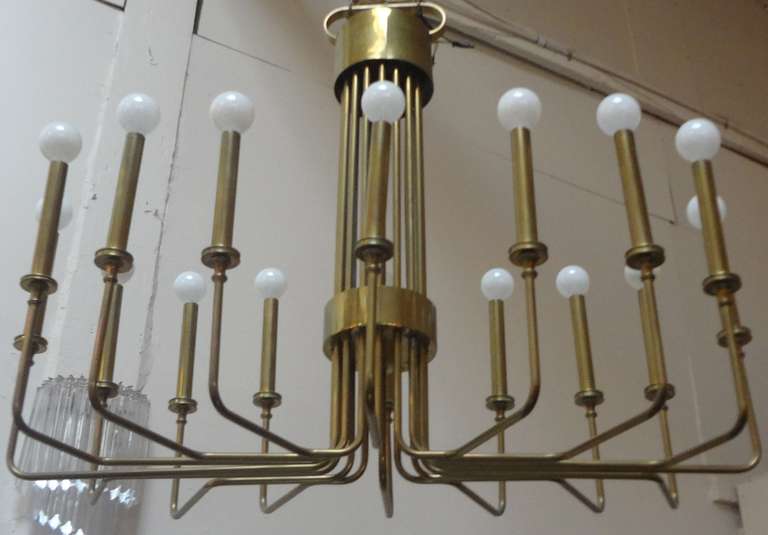 Stunning brass 16-arm chandelier by Hart Associates. In excellent condition with just enough patina to brass--could be polished at customers request.  Retains original label to canopy.