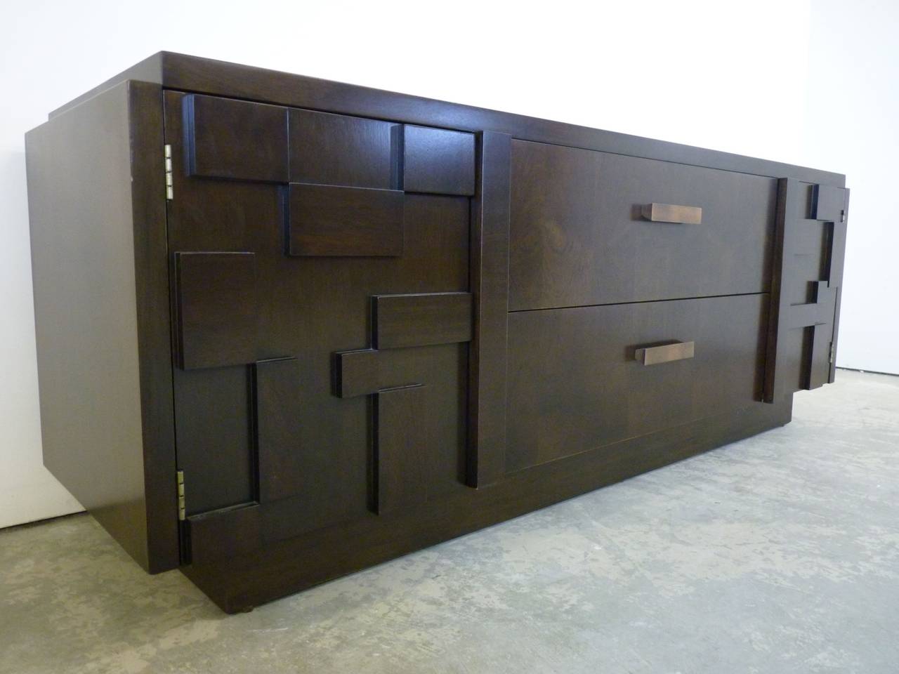 Brutalist style, mosaic dresser in dark walnut with patinated brass hardware by Lane. In like new condition as this piece was seldom used and still retains manufacturer's original showroom tags to interior of drawers.