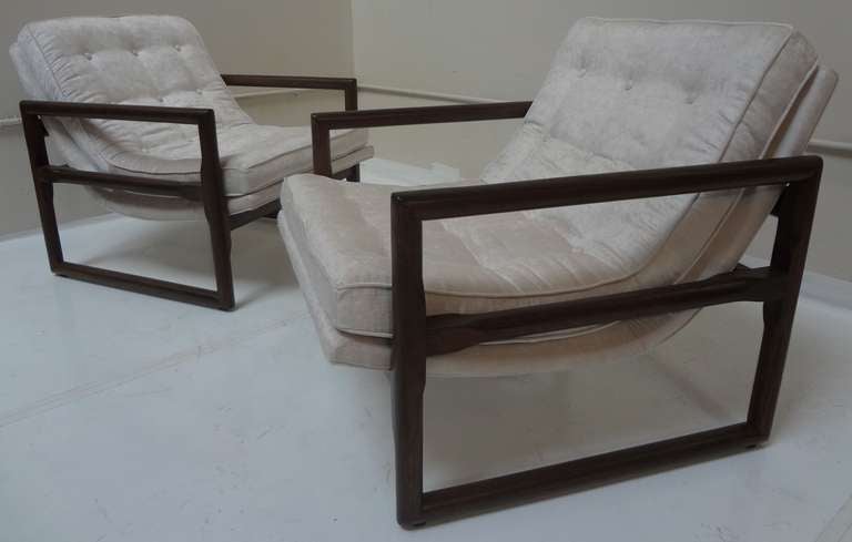 Pair of cubed frame lounge chairs with tufted scoop seats designed by Milo Baughman for Thayer Coggin circa1970s. Solid oak frames are refinished in a dark walnut hue and finished with a clear lacquer. Tufted scoop seats are reupholstered in a