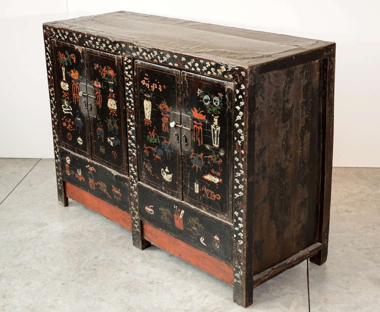 An early 19th century Chinese painted double cabinet, with thick cloth lacquer and detailed images. From Shanxi Province.
C526.
