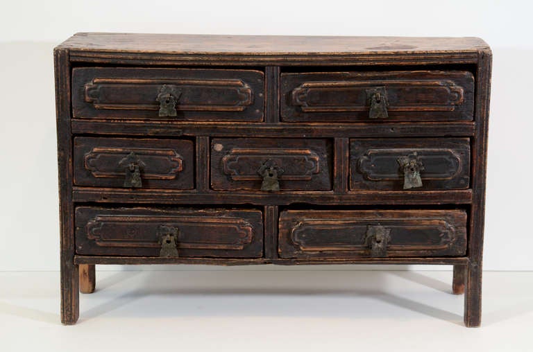 A nicely carved small apothecary cabinet with a beautiful patina. From Shanxi Province, circa 1800.
C419.
